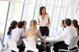 Employee meeting in conference room. Employment Practices Liability Insurance